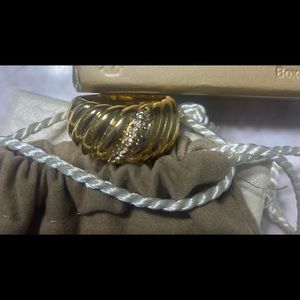 Stainless steel ring with cubic zircoia stones.